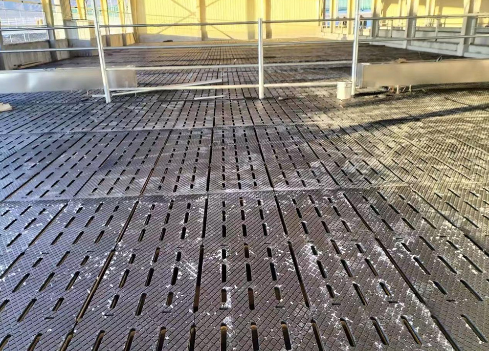 Mat en caoutchouc de fuite de fumier